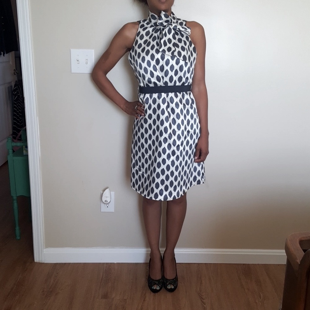 Abstract polka dots  tie neck dress.
